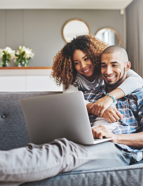 Young couple on their laptop